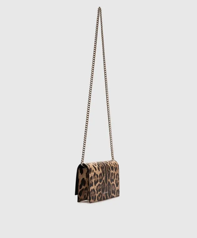 Alexander McQueen Borsa a tracolla con teschio in stampa animalier con cristalli in marrone 6130881AATM