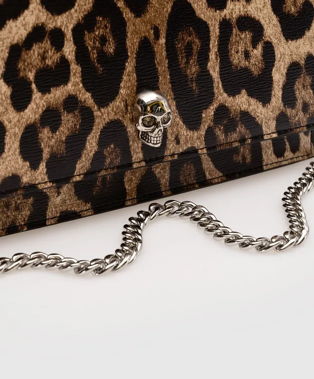 Alexander McQueen Borsa a tracolla con teschio in stampa animalier con cristalli in marrone 6130881AATM